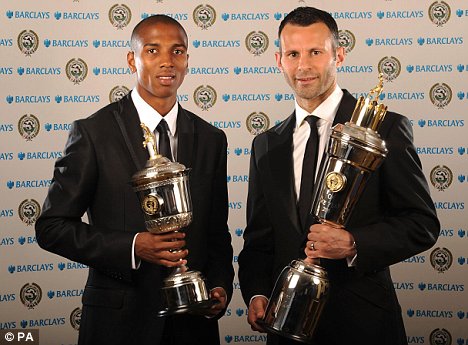 Two pillars of the footballing community with their awards.